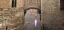 Castle walkway with multiple highlighted people marked for removal using iOS’s ‘Clean Up’ tool, shown in red, orange, and purple outlines.